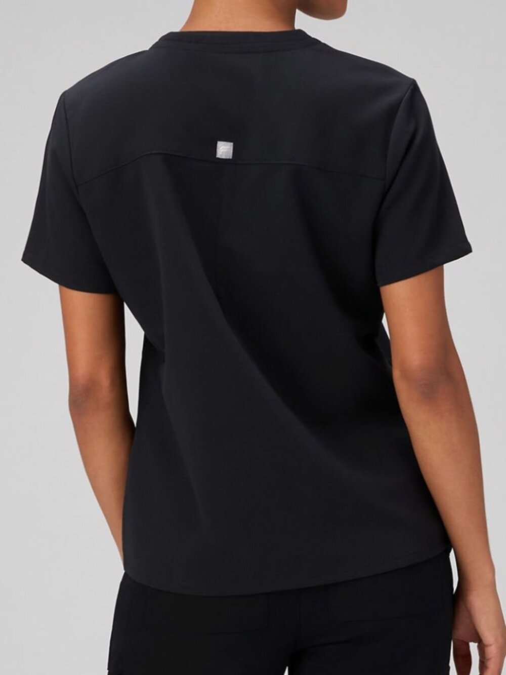Fabletics Vital Scrub Top in Black - Picture 2 of 7